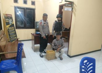 Jelang Nataru Polsek Nuhon Amankan 20 Liter Miras